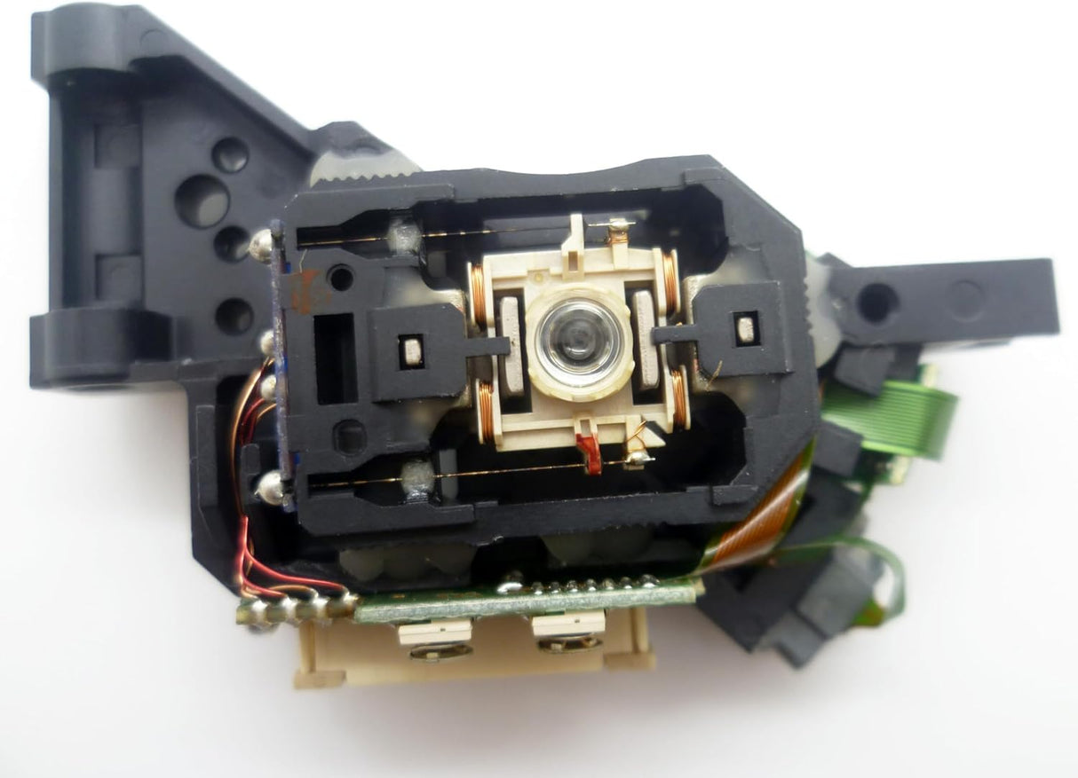 Laser assembly unit for Xbox 360, predominantly black in color with some green wiring and metallic parts visible.